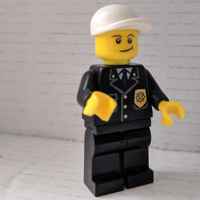 Policeman, Black Suit with Badge, White Cap
