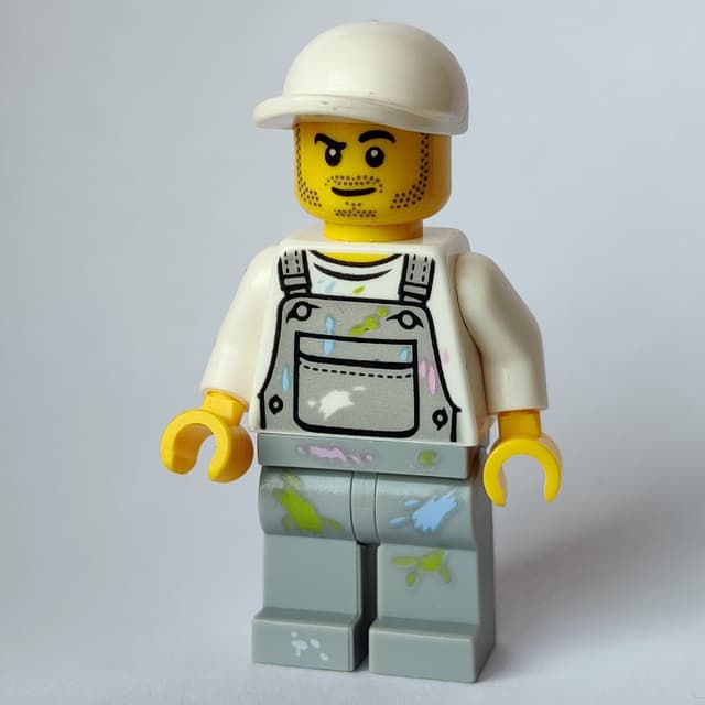 Man, Light Bluish Gray Overalls with Paint Stains, White Cap, Stubble
